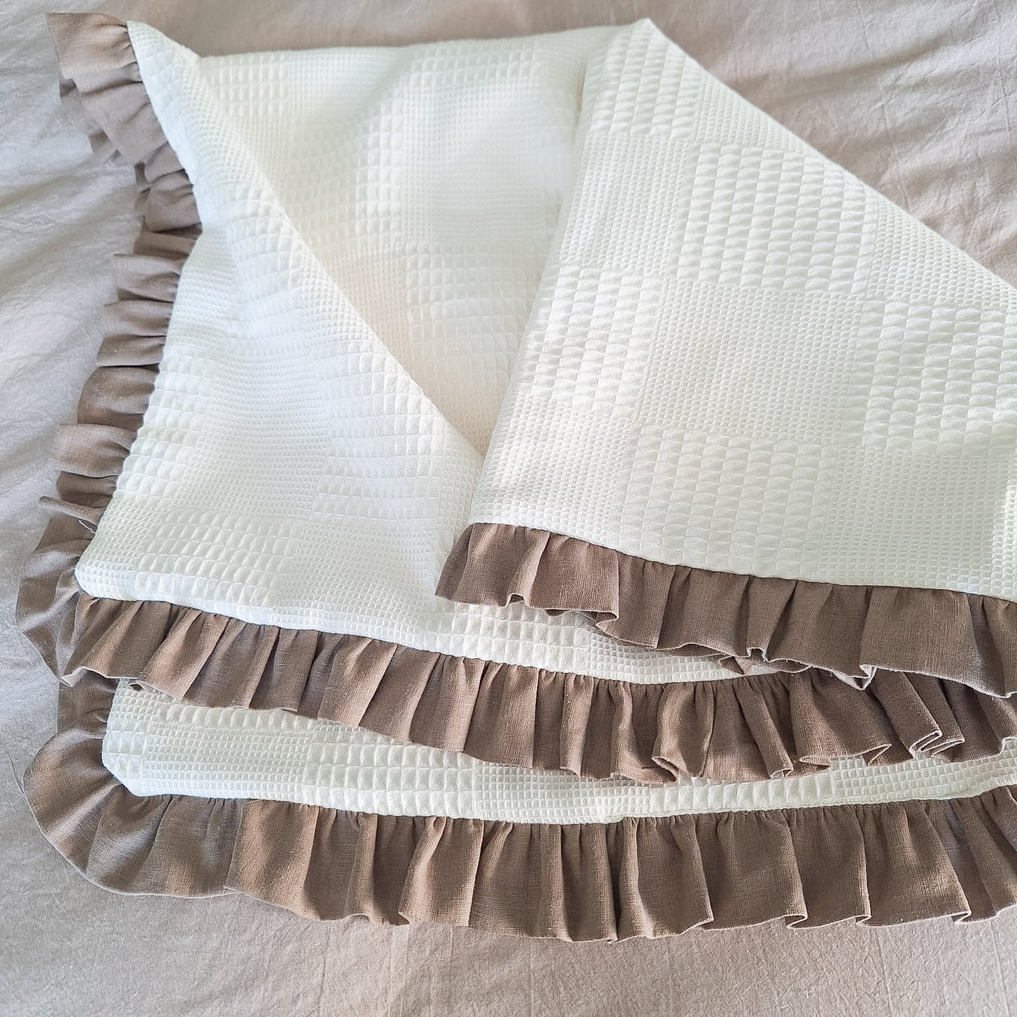 Manta reversible en tela panal doble capa