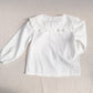 Blusa Blanca cuello vuelitos