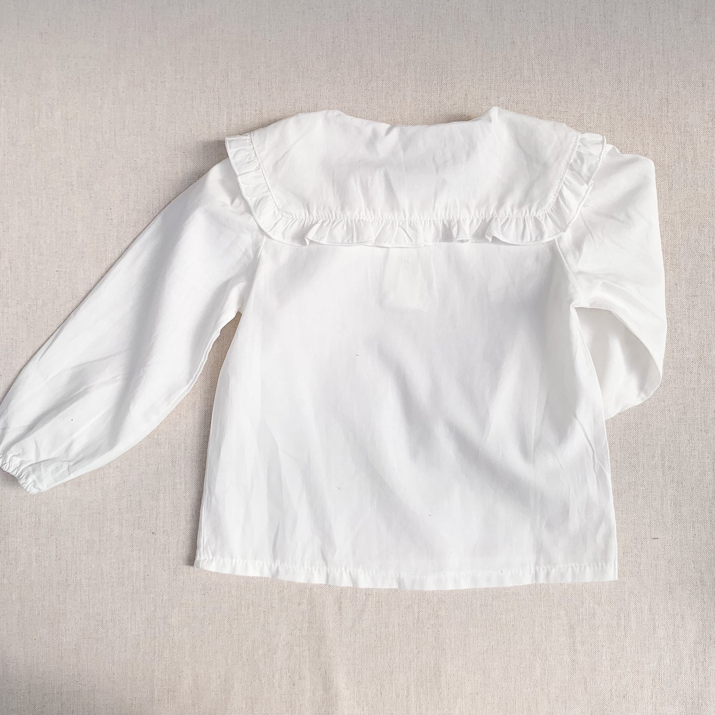 Blusa Blanca cuello vuelitos