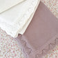 Manta tejida vuelos - dusty rose