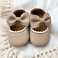 Zapatos taupe con lazo